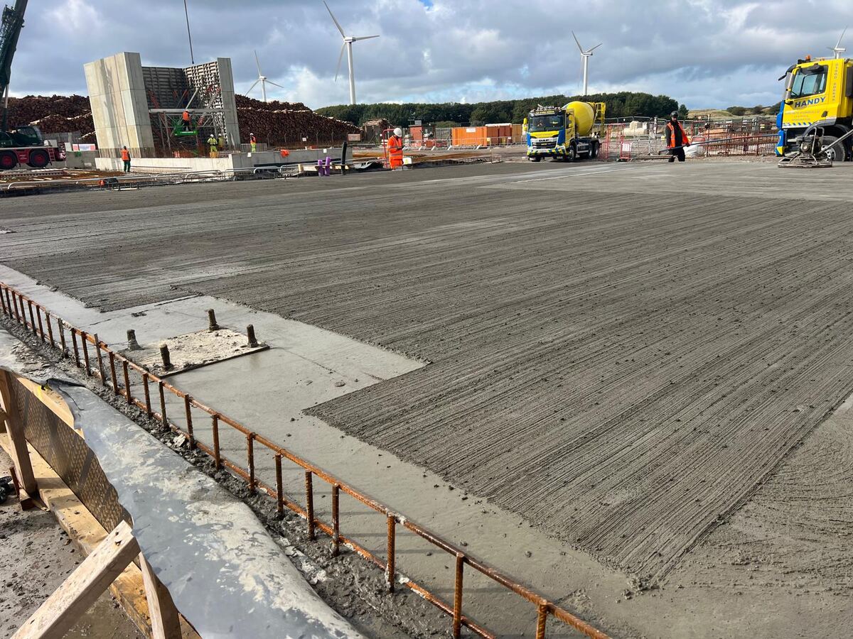 Freshly textured external concrete slab with edge reinforcement