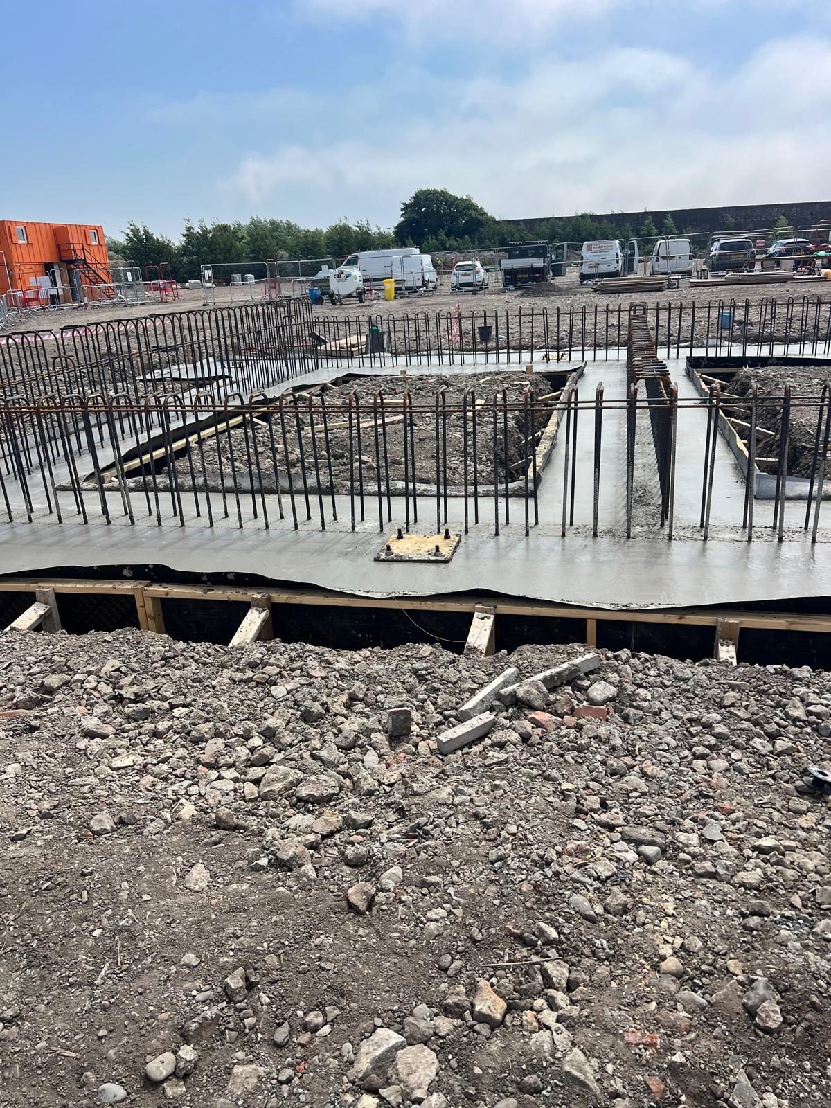 Ground beam reinforcement fixed in the excavations