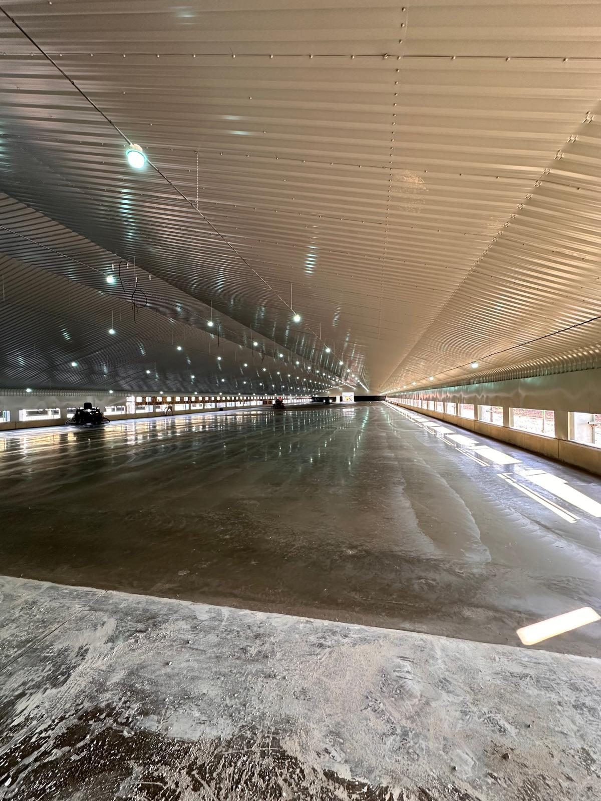 Concrete floor along the length of a long shed